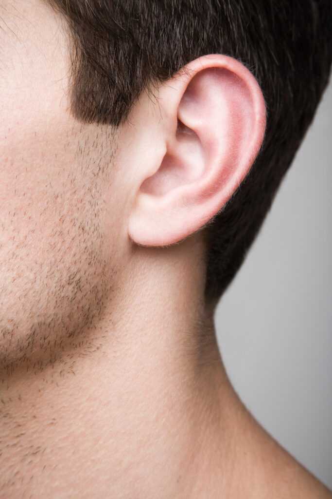 Otoplasty Close up of man